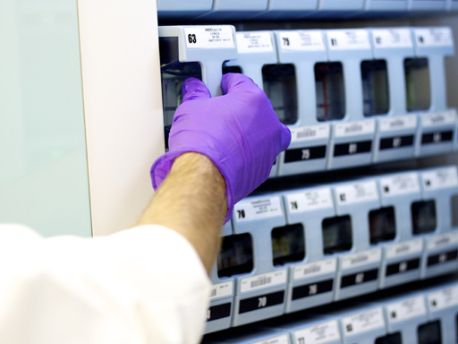 Pharmacist filling pill packaging machine